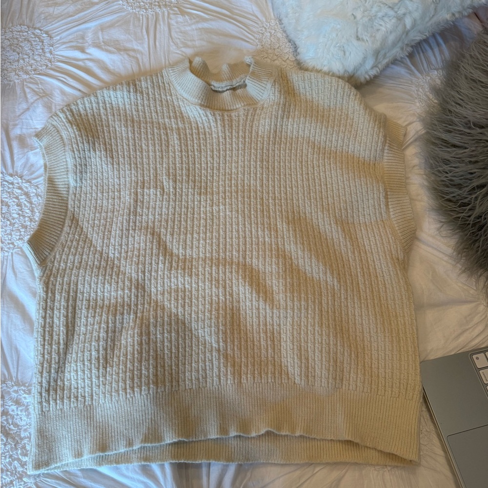 Tagless cream sweater